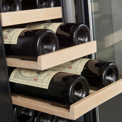 Wine bottles in a wooden wine rack inside a refrigerator.