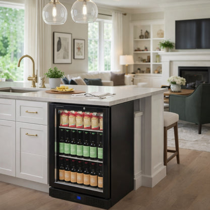 Black wine cooler in a modern kitchen with white island and living room in the background