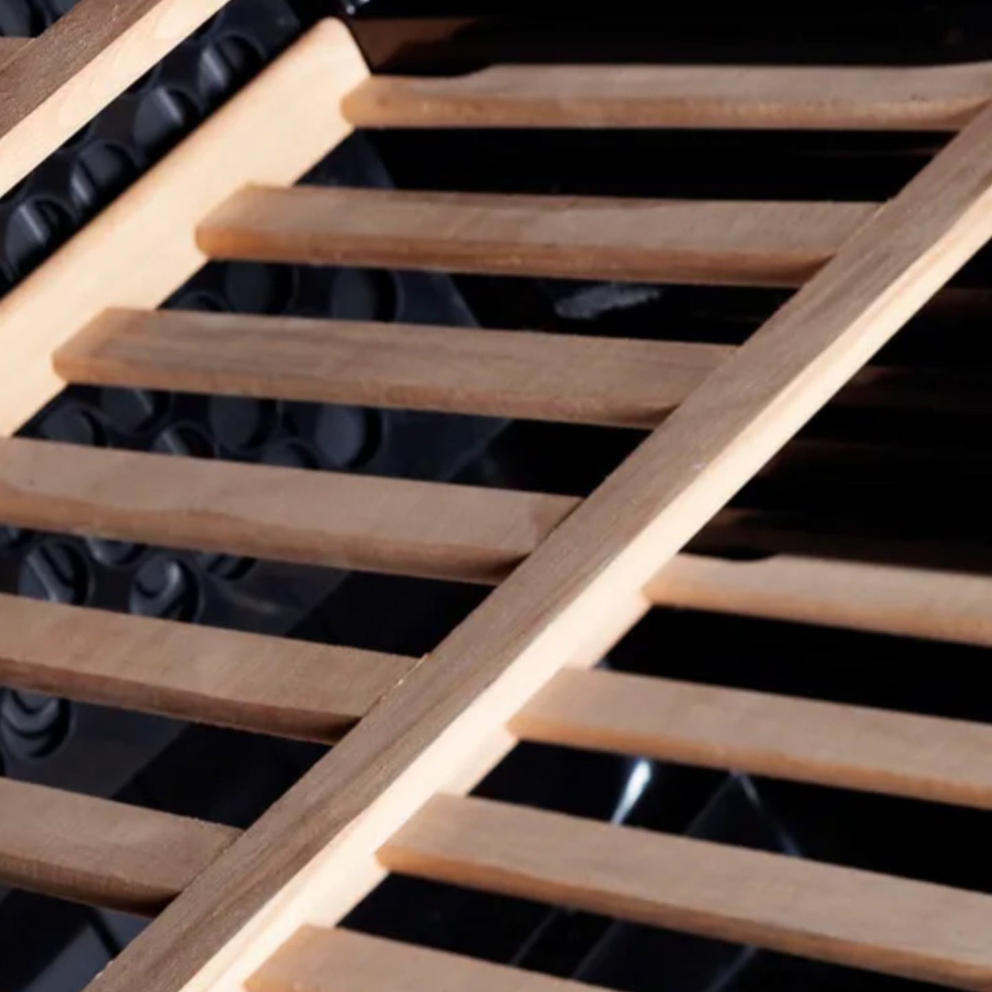 Wooden grill rack on a black background